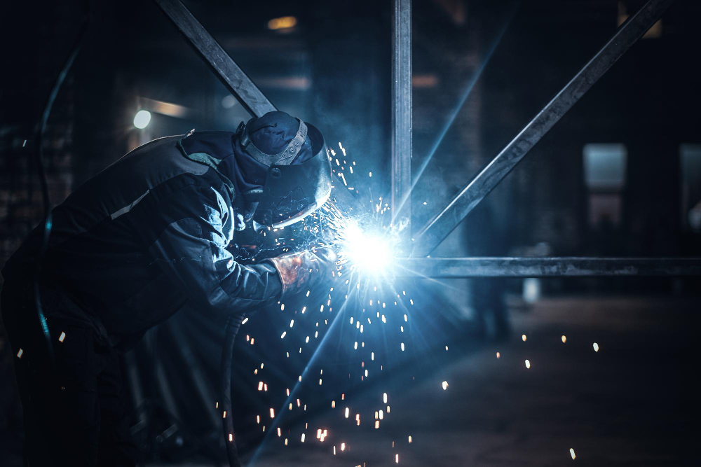 Expert welder performing metal fabrication and repairs